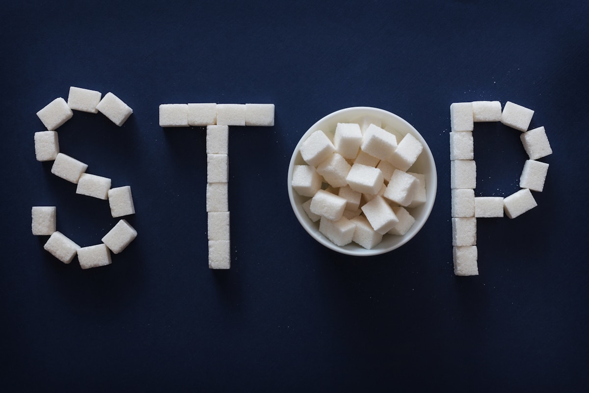 Sugar STOP sign on dark blue background